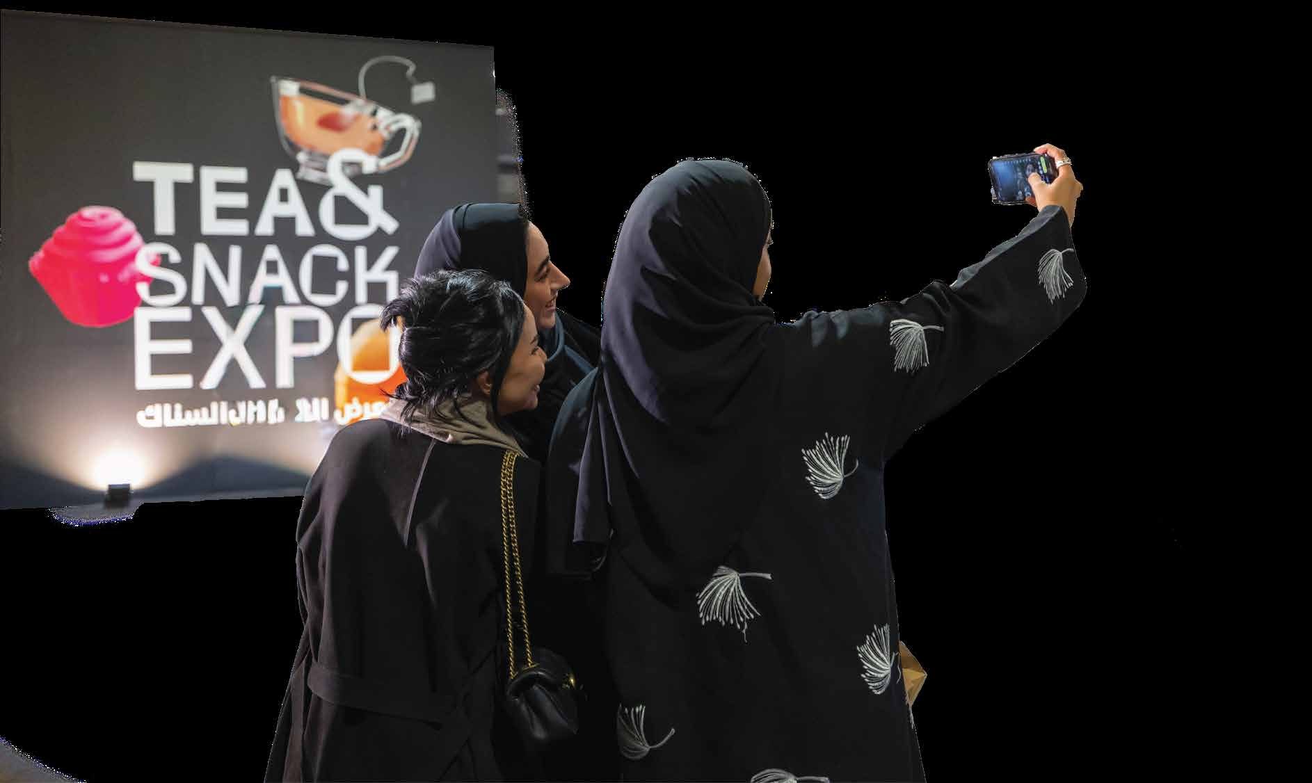 A selfie by the logo